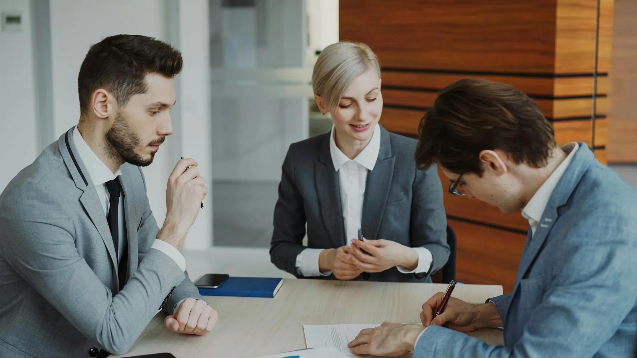 Executive investors and business leaders in a strategy meeting